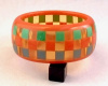 Evans18 Judith Evans wide mini checkerboard bangle with orange border